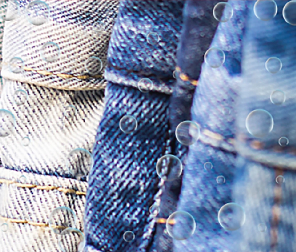various shades of blue denim jeans with a layer of bubbles floating on top